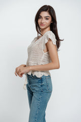 Linda Back cross top