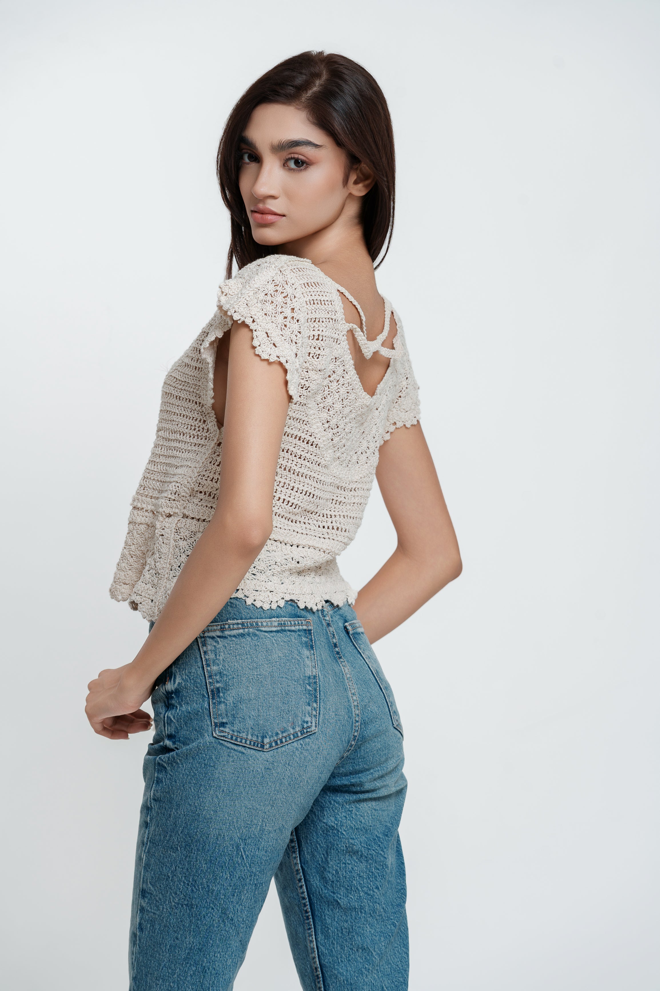 Linda Back cross top